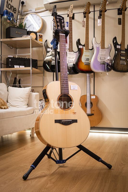 Front view of the Trumon Tsmini 15 acoustic pickup with pickup, 36 inch acoustic guitar